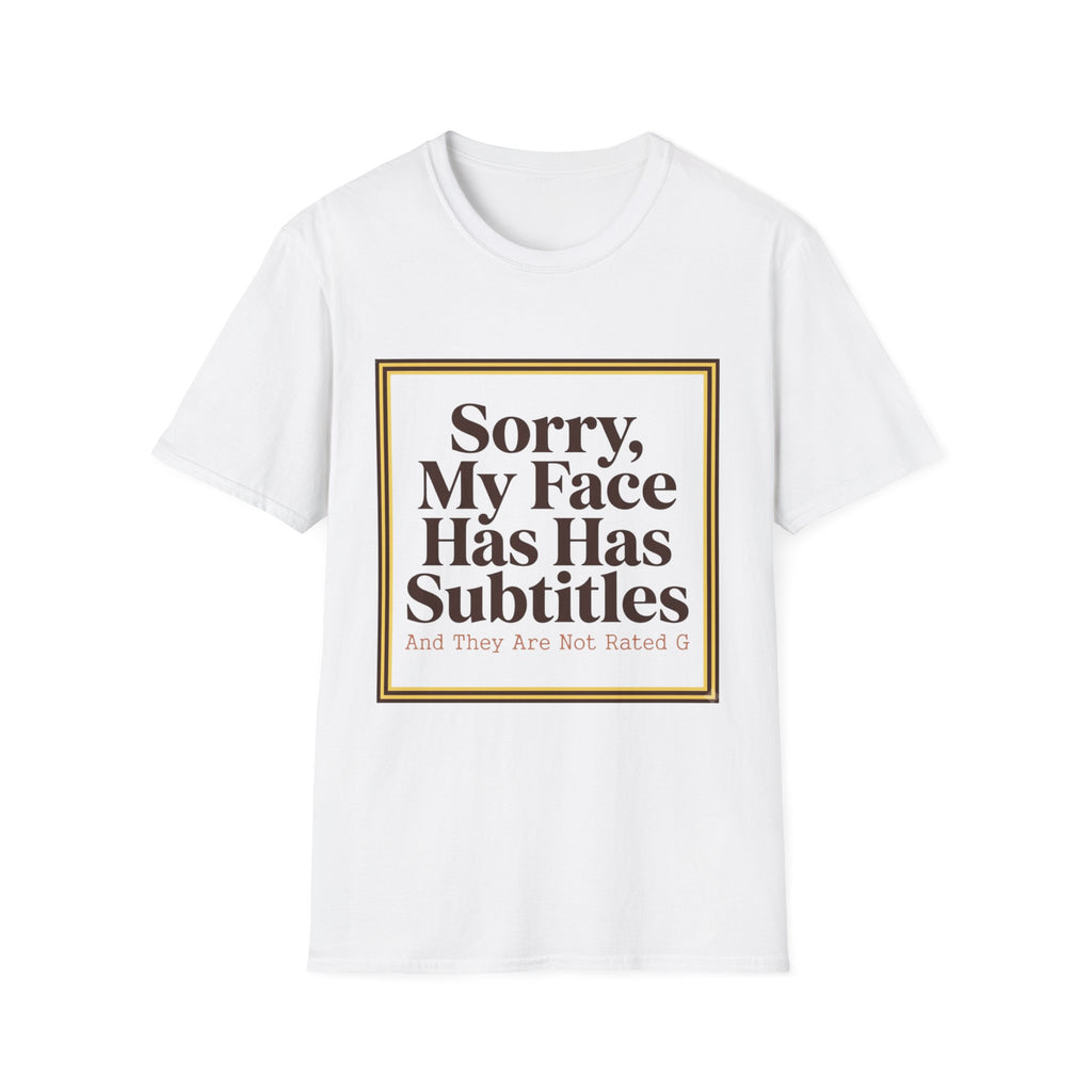 A white short-sleeve crewneck t-shirt with a graphic print on the front. The print features a gold-bordered square containing the text 'Sorry, My Face Has Has Subtitles And They Are Not Rated G' in dark brown lettering.