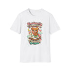 A white short-sleeve crewneck t-shirt featuring a colorful cartoon graphic of a teddy bear on a rocking horse with the text 'Emotionally Unavailable' and 'Physically Present'.