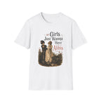 A white short-sleeve crewneck t-shirt featuring a vintage-style graphic print of two young girls in old-fashioned dresses with the text 'Girls Just Wanna Have Alibis 1974'.