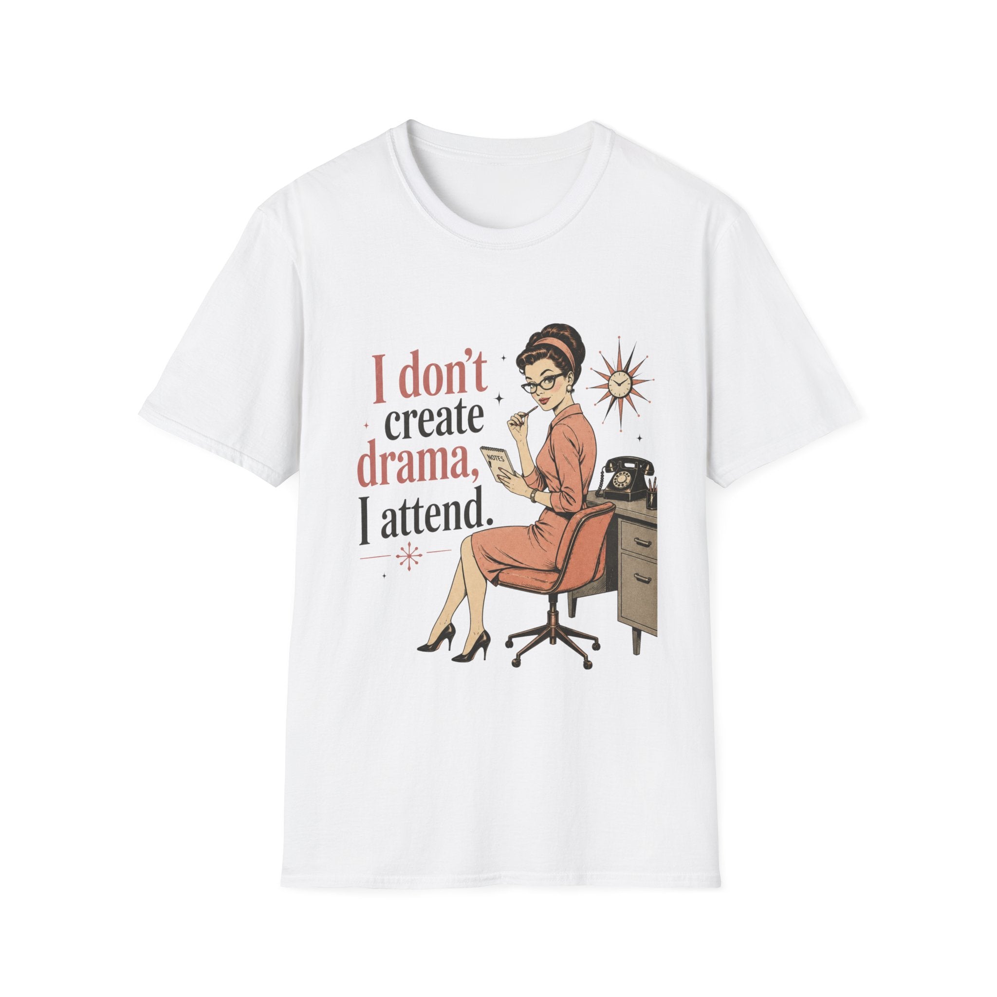 A white short-sleeve crewneck t-shirt featuring a retro-style graphic of a woman in a pink dress sitting at a desk with the text 'I don't create drama, I attend.'.