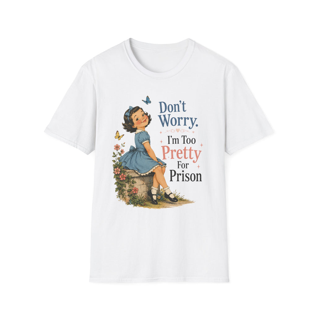 A white short-sleeve crewneck t-shirt featuring a vintage-style graphic of a young girl in a blue dress sitting on a stone, surrounded by flowers and butterflies, with the text 'Don't Worry. I'm Too Pretty For Prison' printed on the front.