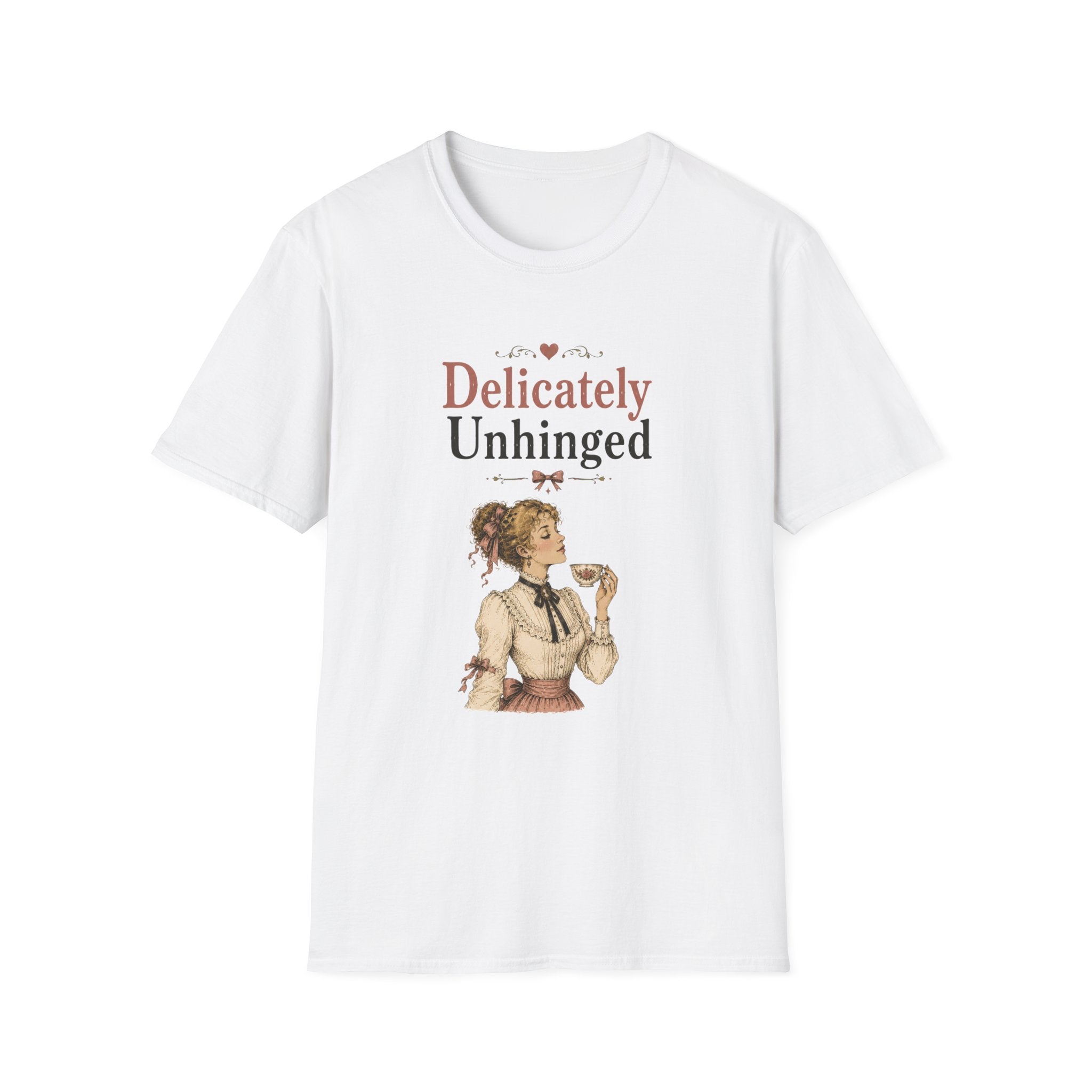 A white short-sleeve crewneck t-shirt featuring a vintage-style graphic print on the front. The graphic displays the text 'Delicately Unhinged' in a dusty rose and black font, above an illustration of a woman in a 1920s flapper outfit.