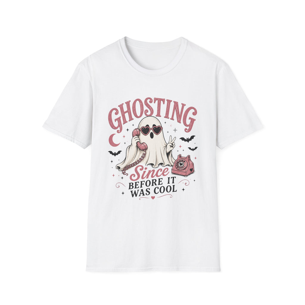 A white short-sleeve crewneck t-shirt featuring a graphic print of a ghost wearing sunglasses with a pink cat, the word 'GHOSTING' in pink, and the text 'Since BEFORE IT WAS COOL' in black and pink.