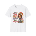 A white short-sleeve crewneck t-shirt featuring a colorful retro graphic with the text 'I'm Not Mean, You're Just Sensitive' and an illustration of a girl with curly hair under a rainbow.