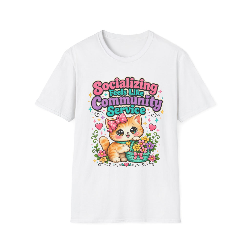 A white short-sleeve crewneck t-shirt featuring a colorful graphic print of a cute orange tabby kitten holding a basket of flowers, surrounded by the text 'Socializing Feels Like Community Service' in pink, purple, and blue lettering.