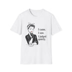 A white short-sleeve crewneck t-shirt featuring a black graphic of a retro-style woman with a bow headband and the text 'I came. I saw.